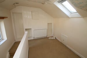 Photo of top bedroom before renovation